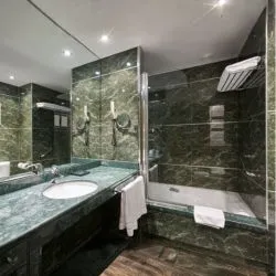 Luxury bathroom in green marble. Decoraton hotel home interior. Horizontal Luxury bathroom in green marble. Decoraton hotel home interior. Horizontal